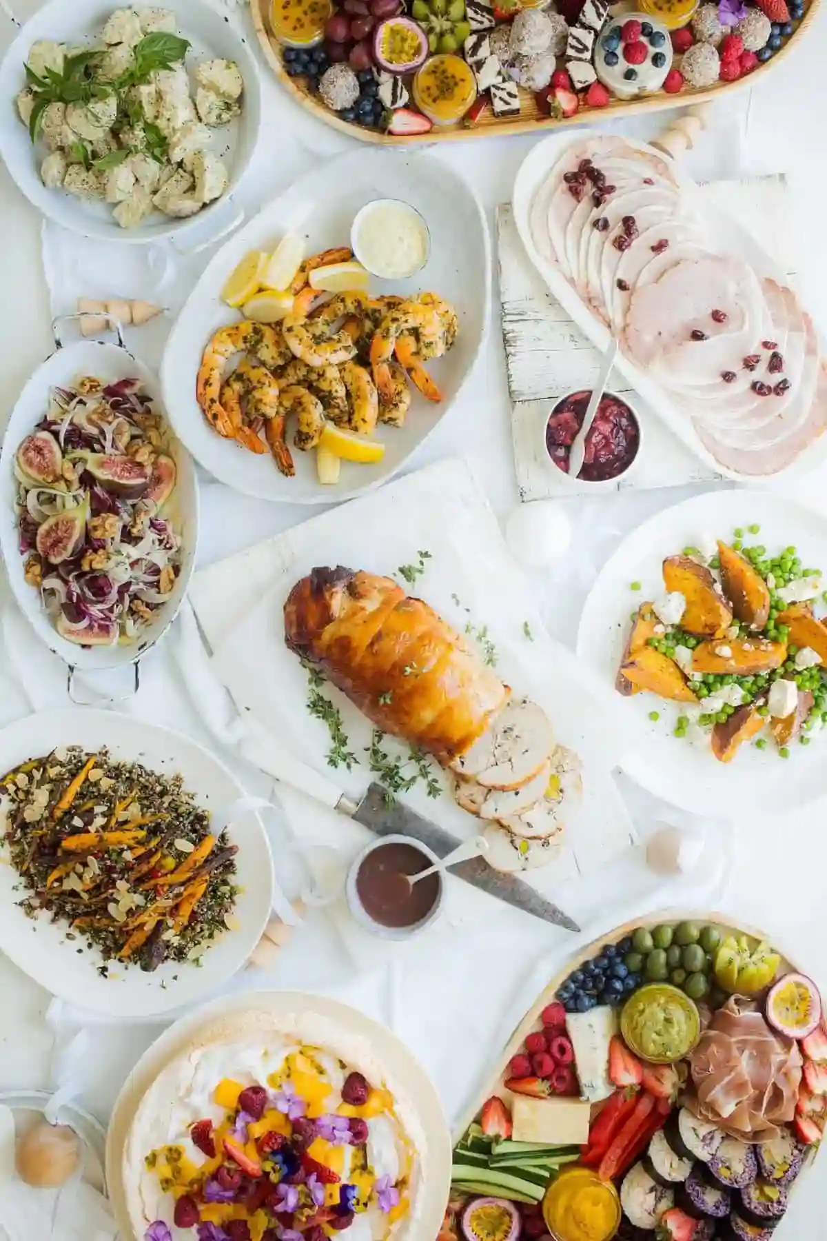 A vibrant lunch spread featuring a grilled chicken wrap, quinoa salad, and a bowl of hearty soup with fresh herbs.